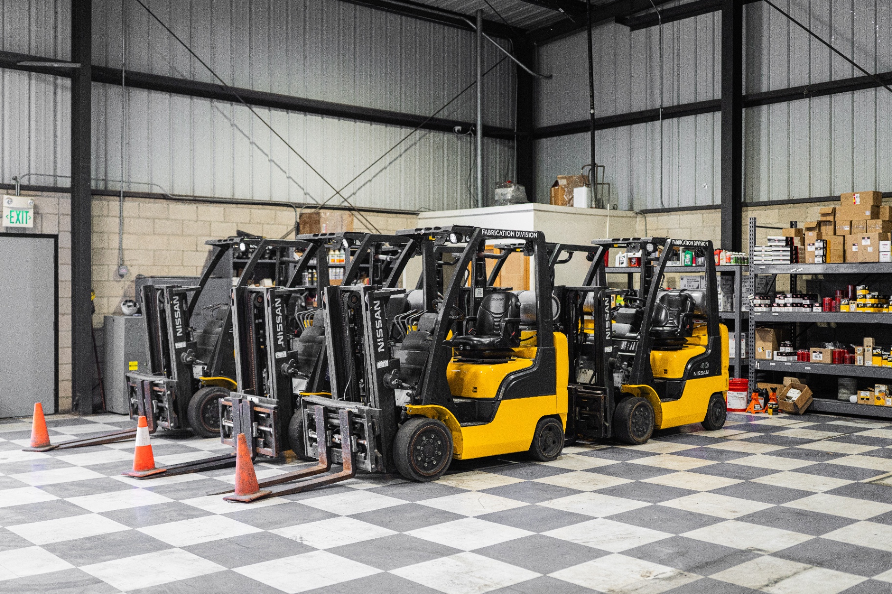 CW Industries forklift fleet in shop